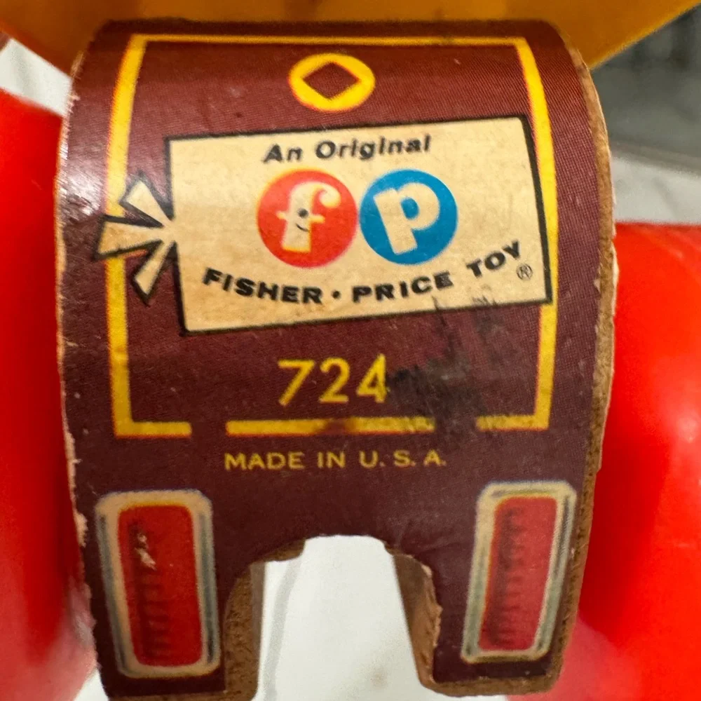 Vintage Fisher Price Jolly Jallopy pull toy from 1974.